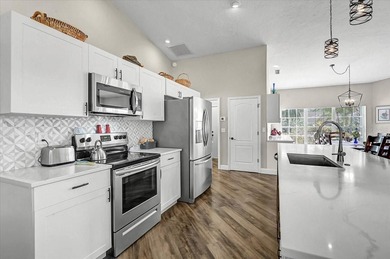 Absolutely beautiful and spacious! This 3-bedroom, 2-bath home on The Meadows Golf and Country Club in Florida - for sale on GolfHomes.com, golf home, golf lot