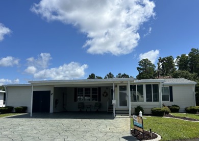 This home is located within a 55+ resort style leased land on Big Cypress Golf and Country Club in Florida - for sale on GolfHomes.com, golf home, golf lot