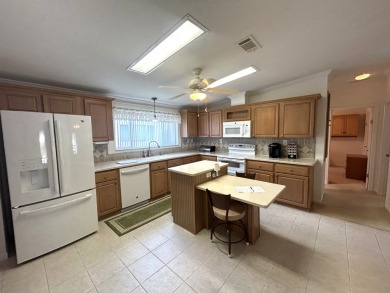 This home is located within a 55+ resort style leased land on Big Cypress Golf and Country Club in Florida - for sale on GolfHomes.com, golf home, golf lot