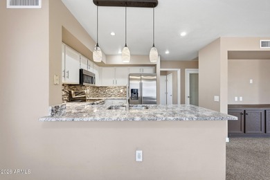 This stunning Wexford model sits on an oversized corner on Trail Ridge Golf Course in Arizona - for sale on GolfHomes.com, golf home, golf lot