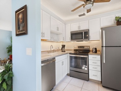 Washer  Dryer in unit!Panoramic water  golf course views this on Vero Beach South Golf Course in Florida - for sale on GolfHomes.com, golf home, golf lot