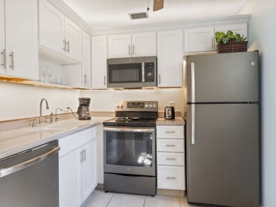 Washer  Dryer in unit!Panoramic water  golf course views this on Vero Beach South Golf Course in Florida - for sale on GolfHomes.com, golf home, golf lot