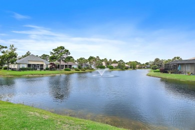 Welcome to this charming lakefront home in the private gated on Emerald Bay Golf Club in Florida - for sale on GolfHomes.com, golf home, golf lot