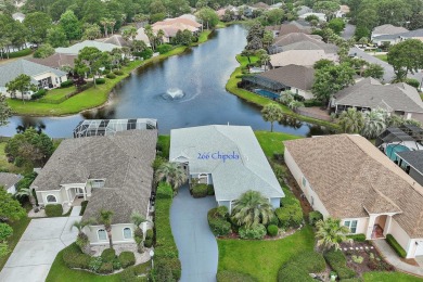 Welcome to this charming lakefront home in the private gated on Emerald Bay Golf Club in Florida - for sale on GolfHomes.com, golf home, golf lot