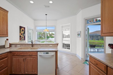 Welcome to this charming lakefront home in the private gated on Emerald Bay Golf Club in Florida - for sale on GolfHomes.com, golf home, golf lot