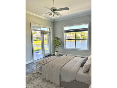 Welcome to this charming lakefront home in the private gated on Emerald Bay Golf Club in Florida - for sale on GolfHomes.com, golf home, golf lot