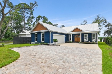 Indulge in the pinnacle of bayfront luxury with this exceptional on Windswept Dunes Golf Club in Florida - for sale on GolfHomes.com, golf home, golf lot
