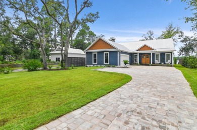 Indulge in the pinnacle of bayfront luxury with this exceptional on Windswept Dunes Golf Club in Florida - for sale on GolfHomes.com, golf home, golf lot