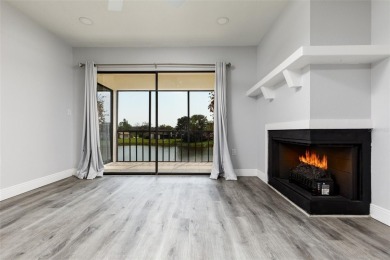 Lovely condo in a gated, golf course community!! This updated on East Lake Woodlands Country Club in Florida - for sale on GolfHomes.com, golf home, golf lot