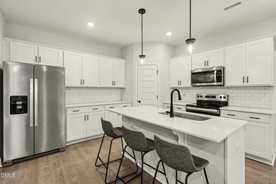 Experience the perfect blend of modern luxury and an active on Riverwood Golf and Athletic Club in North Carolina - for sale on GolfHomes.com, golf home, golf lot