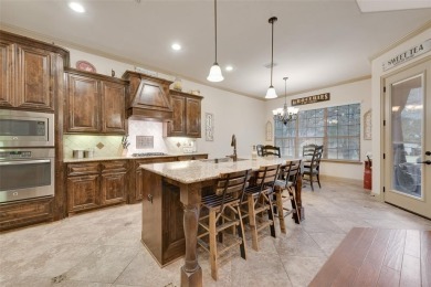 Stunning 4 bedroom, 3.5 bath home located in the only 24-7 gated on The Golf Club at Resort Eagle Mountain Lake in Texas - for sale on GolfHomes.com, golf home, golf lot