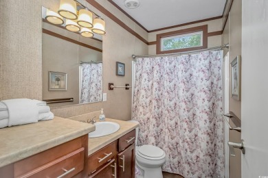 This very open and spacious 3 Bedroom, 2 Bath beach house is on Prestwick Country Club in South Carolina - for sale on GolfHomes.com, golf home, golf lot