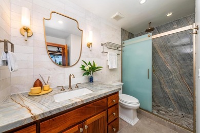 Enjoy sweeping ocean and sunset views from this beautifully on Kona Country Club Golf Course in Hawaii - for sale on GolfHomes.com, golf home, golf lot