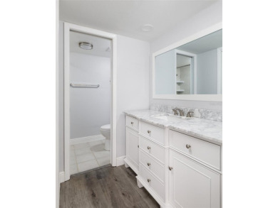 Lovely condo in a gated, golf course community!! This updated on East Lake Woodlands Country Club in Florida - for sale on GolfHomes.com, golf home, golf lot