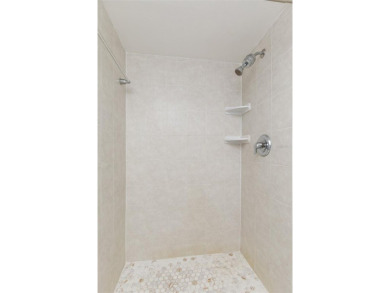 Lovely condo in a gated, golf course community!! This updated on East Lake Woodlands Country Club in Florida - for sale on GolfHomes.com, golf home, golf lot