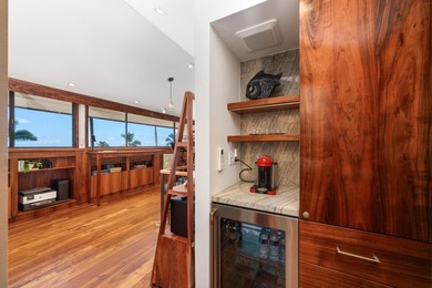 Enjoy sweeping ocean and sunset views from this beautifully on Kona Country Club Golf Course in Hawaii - for sale on GolfHomes.com, golf home, golf lot