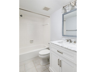 Lovely condo in a gated, golf course community!! This updated on East Lake Woodlands Country Club in Florida - for sale on GolfHomes.com, golf home, golf lot