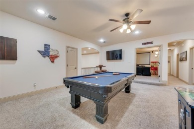 Stunning 4 bedroom, 3.5 bath home located in the only 24-7 gated on The Golf Club at Resort Eagle Mountain Lake in Texas - for sale on GolfHomes.com, golf home, golf lot