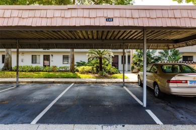 Lovely condo in a gated, golf course community!! This updated on East Lake Woodlands Country Club in Florida - for sale on GolfHomes.com, golf home, golf lot