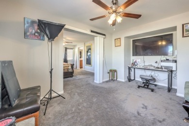 Welcome to a spacious 4-bedroom, 2.5-bath home located in a on Stallion Mountain Golf Course in Nevada - for sale on GolfHomes.com, golf home, golf lot