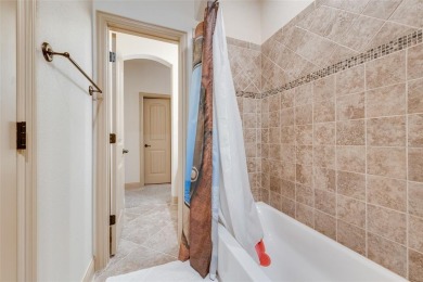 Stunning 4 bedroom, 3.5 bath home located in the only 24-7 gated on The Golf Club at Resort Eagle Mountain Lake in Texas - for sale on GolfHomes.com, golf home, golf lot