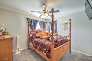 Welcome to a spacious 4-bedroom, 2.5-bath home located in a on Stallion Mountain Golf Course in Nevada - for sale on GolfHomes.com, golf home, golf lot