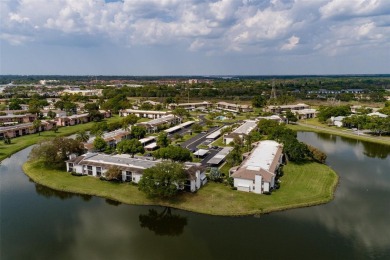 Lovely condo in a gated, golf course community!! This updated on East Lake Woodlands Country Club in Florida - for sale on GolfHomes.com, golf home, golf lot