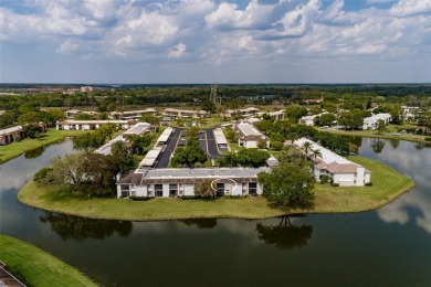 Lovely condo in a gated, golf course community!! This updated on East Lake Woodlands Country Club in Florida - for sale on GolfHomes.com, golf home, golf lot