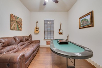 Stunning 4 bedroom, 3.5 bath home located in the only 24-7 gated on The Golf Club at Resort Eagle Mountain Lake in Texas - for sale on GolfHomes.com, golf home, golf lot