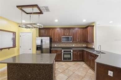 One or more photo(s) has been virtually staged. Tucked within on Brookridge Country Club in Florida - for sale on GolfHomes.com, golf home, golf lot