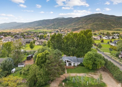 Welcome to your own private slice of Midway paradise where on Homestead Golf Club and Resort in Utah - for sale on GolfHomes.com, golf home, golf lot