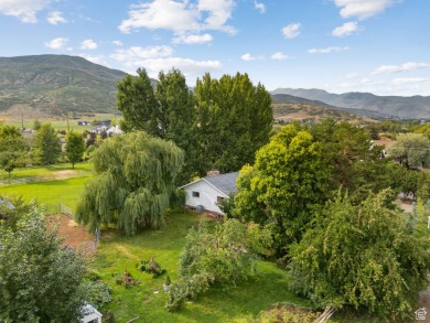 Welcome to your own private slice of Midway paradise where on Homestead Golf Club and Resort in Utah - for sale on GolfHomes.com, golf home, golf lot