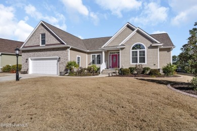 Discover this exquisite custom-built home, nestled within the on Brunswick Plantation and Golf Resorts in North Carolina - for sale on GolfHomes.com, golf home, golf lot