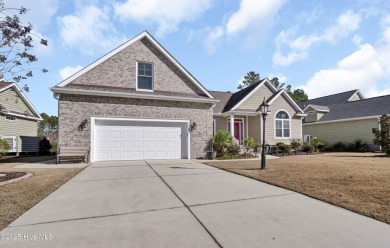 Discover this exquisite custom-built home, nestled within the on Brunswick Plantation and Golf Resorts in North Carolina - for sale on GolfHomes.com, golf home, golf lot