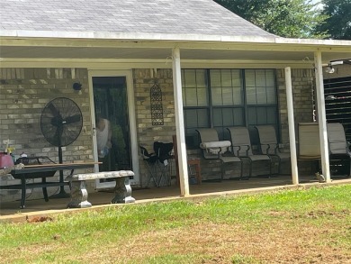 Charming 3 bedroom 2 bath home on over .5 acre located near on The Challenge At Gladewater in Texas - for sale on GolfHomes.com, golf home, golf lot
