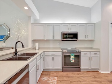 Beautifully updated and meticulously maintained, this 3-bedroom on The Colony Golf and Country Club in Florida - for sale on GolfHomes.com, golf home, golf lot