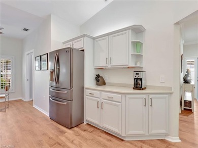 Beautifully updated and meticulously maintained, this 3-bedroom on The Colony Golf and Country Club in Florida - for sale on GolfHomes.com, golf home, golf lot