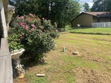 Charming 3 bedroom 2 bath home on over .5 acre located near on The Challenge At Gladewater in Texas - for sale on GolfHomes.com, golf home, golf lot