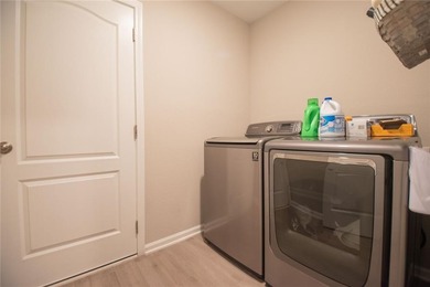 Beautifully maintained 4-bedroom, 3-bathroom home located in the on The Club At Osprey Cove in Georgia - for sale on GolfHomes.com, golf home, golf lot