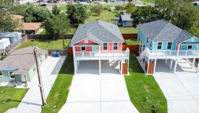 The home is elevated on pilings to allow for covered parking and on Rockport Country Club in Texas - for sale on GolfHomes.com, golf home, golf lot