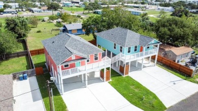 The home is elevated on pilings to allow for covered parking and on Rockport Country Club in Texas - for sale on GolfHomes.com, golf home, golf lot