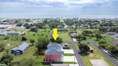 The home is elevated on pilings to allow for covered parking and on Rockport Country Club in Texas - for sale on GolfHomes.com, golf home, golf lot