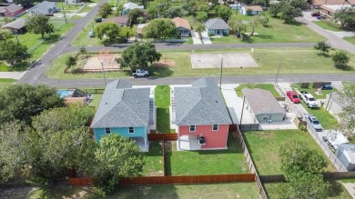 The home is elevated on pilings to allow for covered parking and on Rockport Country Club in Texas - for sale on GolfHomes.com, golf home, golf lot