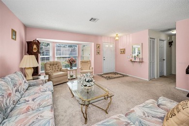 IN TIMBER GREENS A 55+ GATED GOLF COMMUNITY, this 2 Bedroom 2 on Timber Greens Country Club in Florida - for sale on GolfHomes.com, golf home, golf lot