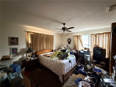 Seize the opportunity rehab this lovely three-bedroom home on Ebony Hills Public Golf Course in Texas - for sale on GolfHomes.com, golf home, golf lot