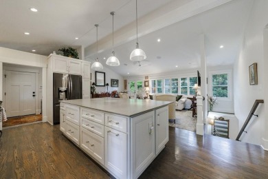 Stunning home with a rocking chair front porch on a friendly on Bobby Jones Golf Club in Georgia - for sale on GolfHomes.com, golf home, golf lot