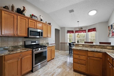 MAGNIFICENT 3/2 TURNKEY(some exceptions) Whispering Pine with on The Links of Spruce Creek in Florida - for sale on GolfHomes.com, golf home, golf lot