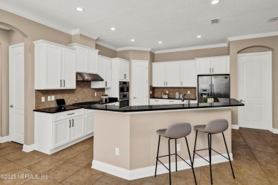 Discover your dream home in the highly sought-after Willowcove on Palm Valley Golf Club in Florida - for sale on GolfHomes.com, golf home, golf lot