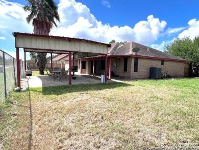 SINGLE STORY HOME WITH HIGH CEILINGS, FAMILY ROOM, 2 EATING on Brownsville Golf Center in Texas - for sale on GolfHomes.com, golf home, golf lot