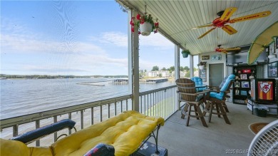 Welcome to your lakefront retreat in the most sought after on Seasons Ridge At Four Seasons in Missouri - for sale on GolfHomes.com, golf home, golf lot